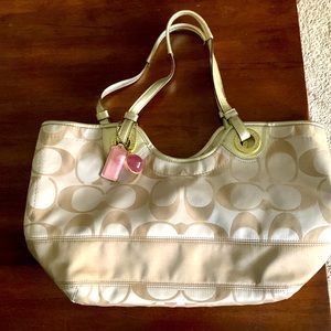 Beautiful Champagne and Gold Coach bag